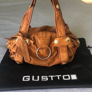 GUSTTO soft leather hobo bag. Neutral color purse